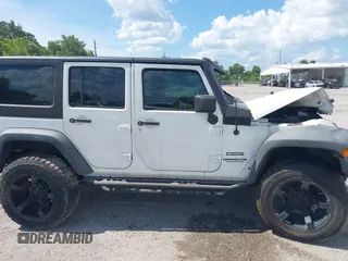 2016 Jeep Wrangler Unlimited Sport with VIN 1C4BJWDGXGL335825, listed as a IAAI auction lot 28960589 with 28,515 mi miles and . Bid and sale history available at DreamBid. Image 14.