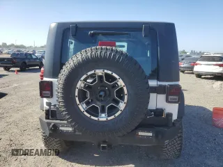 2010 Jeep Wrangler Rubicon with VIN 1J4BA6D18AL221240, listed as a Copart auction lot 57819025 with 78,120 mi miles and Salvage title. Bid and sale history available at DreamBid. Image 6.