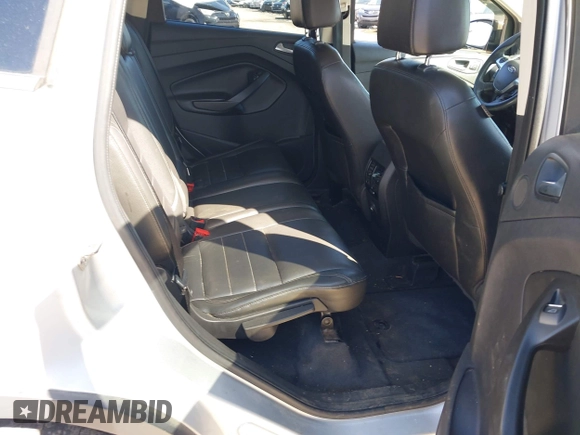 2013 Ford Escape SEL with VIN 1FMCU9H94DUA25017, listed as a IAAI auction lot 41976238 with 171,885 mi miles and . Bid and sale history available at DreamBid. Image 8.
