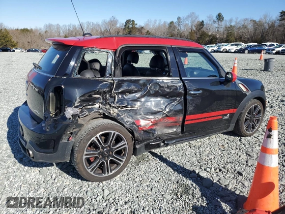 2014 MINI Countryman John Cooper Works with VIN WMWXD1C5XEWS34681, listed as a Copart auction lot 41781005 with 133,463 mi miles and Salvage Title. Bid and sale history available at DreamBid. Image 3.