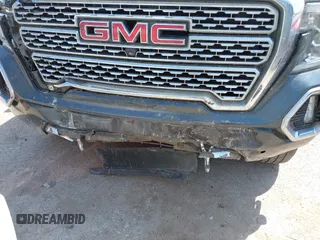 2019 GMC Sierra 1500 Denali z VIN 1GTU9FEL5KZ387012, wystawiony jako IAAI lot #42002743 z przebiegiem 124 718 mil mil oraz . Historia ofert i sprzedaży dostępna na DreamBid. Obrazek 6.