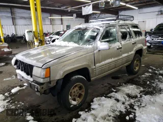 1997 Jeep Grand Cherokee Limited with VIN 1J4GZ78Y1VC706353, listed as a Copart auction lot 41437085 with 163,675 mi miles and Salvage Title. Bid and sale history available at carsss.com. Image 1.