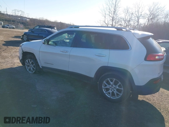 2015 Jeep Cherokee Latitude with VIN 1C4PJMCB3FW734573, listed as a IAAI auction lot 41825561 with 141,250 mi miles. Bid and sale history available at carsss.com. Image 3.