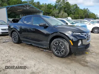 2023 Hyundai Santa Cruz SEL z VIN 5NTJC4AE3PH062519, wystawiony jako Copart lot #59282785 z przebiegiem Nie podano mil oraz Nie do naprawy • Non repairable. Historia ofert i sprzedaży dostępna na DreamBid. Obrazek 4.