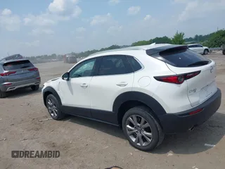 2021 Mazda CX-30 Premium with VIN 3MVDMBDL0MM307045, listed as a IAAI auction lot 42446494 with 33,112 mi miles and . Bid and sale history available at DreamBid. Image 3.