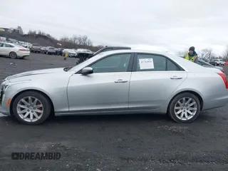 2014 Cadillac CTS Luxury AWD z VIN 1G6AX5SX3E0194895, wystawiony jako IAAI lot #41741824 z przebiegiem 197 042 mil mil oraz . Historia ofert i sprzedaży dostępna na DreamBid. Obrazek 14.