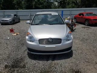 2006 Hyundai Accent GLS z VIN KMHCN46C46U060741, wystawiony jako Copart lot #59560575 z przebiegiem 93 966 mil mil oraz Szkoda całkowita • Salvage title. Historia ofert i sprzedaży dostępna na DreamBid. Obrazek 5.