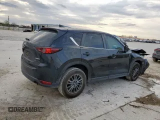 2021 Mazda CX-5 Sport with VIN JM3KFABM7M0325089, listed as a Copart auction lot 50479415 with 137,705 mi miles and Salvage Title. Bid and sale history available at carsss.com. Image 3.