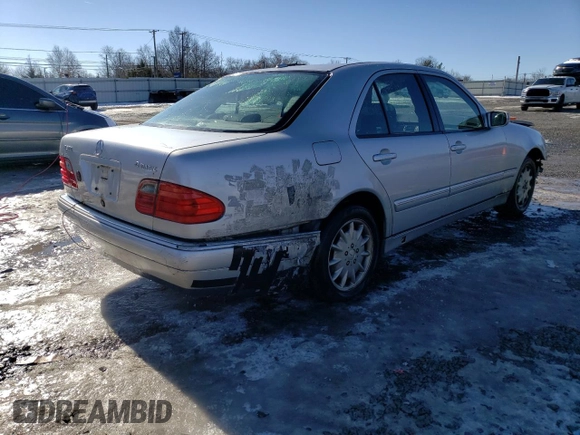 2000 Mercedes-Benz E-Class with VIN WDBJF82J5YX030071, listed as a Copart auction lot 42430025 with 122,612 mi miles and Salvage Title. Bid and sale history available at carsss.com. Image 3.