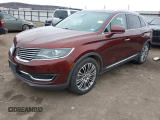 2016 Lincoln MKX Reserve z VIN 2LMPJ6LP0GBL42595, wystawiony jako IAAI lot #41248786 z przebiegiem 99 895 mil mil oraz . Historia ofert i sprzedaży dostępna na DreamBid. Obrazek 2.