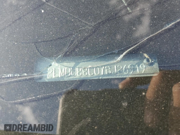 2007 Lincoln MKX z VIN 2LMDU88C07BJ26919, wystawiony jako Copart lot #55778005 z przebiegiem Nie podano mil oraz Szkoda całkowita • Salvage title. Historia ofert i sprzedaży dostępna na DreamBid. Obrazek 12.