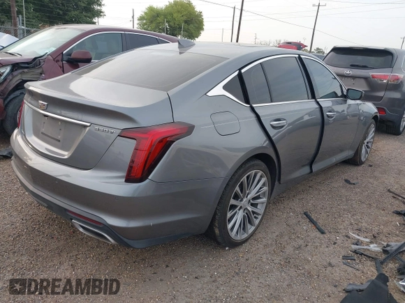 2021 Cadillac CT5 Premium Luxury z VIN 1G6DN5RK3M0146941, wystawiony jako IAAI lot #41934950 z przebiegiem Nie podano mil oraz . Historia ofert i sprzedaży dostępna na DreamBid. Obrazek 4.