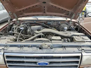 1989 Ford Bronco XL z VIN 1FMEU15N6KLA87551, wystawiony jako Copart lot #56662825 z przebiegiem 87 257 mil mil oraz Czysty tytuł • Clean title. Historia ofert i sprzedaży dostępna na DreamBid. Obrazek 12.