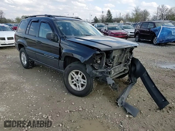 2004 Jeep Grand Cherokee Laredo with VIN 1J4GW48S84C184757, listed as a Copart auction lot 52895745 with 242,307 mi miles and Salvage Title. Bid and sale history available at carsss.com. Image 11.