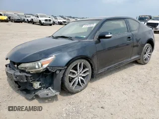 2015 Scion tC z VIN JTKJF5C77F3093396, wystawiony jako Copart lot #57813575 z przebiegiem 140 630 mil mil oraz Szkoda całkowita • Salvage title. Historia ofert i sprzedaży dostępna na DreamBid. Obrazek 1.