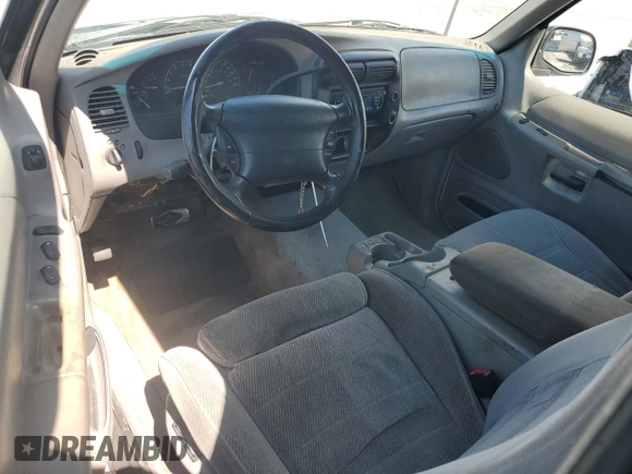 1998 Ford Explorer Sport with VIN 1FMYU22X9WUC05410, listed as a Copart auction lot 56376265 with 251,401 mi miles and Salvage title. Bid and sale history available at DreamBid. Image 8.