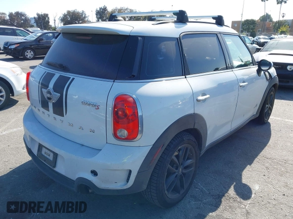 2014 MINI Countryman S с VIN WMWZC5C5XEWM18313, выставлен на аукционе IAAI как лот 42106902 с пробегом 91 662 миль миль и . История ставок и продаж доступна на DreamBid. Изображение 4.
