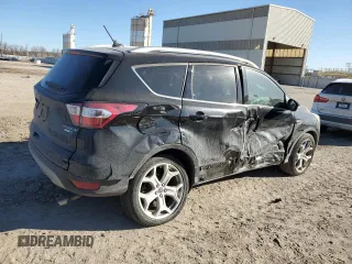 2018 Ford Escape Titanium with VIN 1FMCU9J95JUA36324, listed as a Copart auction lot 47131825 with 63,563 mi miles and Salvage title. Bid and sale history available at DreamBid. Image 3.