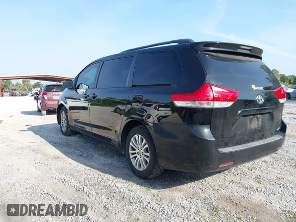 2011 Toyota Sienna XLE AAS with VIN 5TDYK3DC7BS051241, listed as a IAAI auction lot 42214806 with 253,860 mi miles and . Bid and sale history available at DreamBid. Image 3.