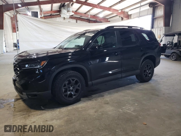 2023 Honda Pilot TrailSport with VIN 5FNYG1H63PB031249, listed as a Copart auction lot 85163934 with 12,058 mi miles and Salvage Title. Bid and sale history available at carsss.com. Image 1.