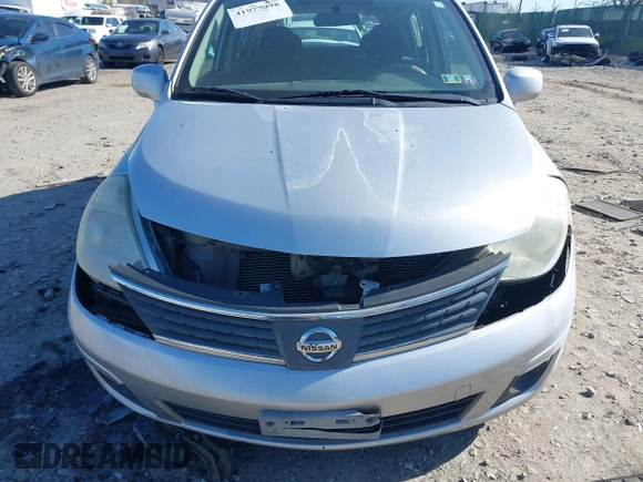 2009 Nissan Versa 1.8 SL with VIN 3N1BC13E09L393563, listed as a IAAI auction lot 41977998 with 163,072 mi miles. Bid and sale history available at carsss.com. Image 12.