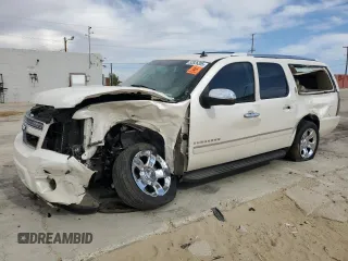 2010 Chevrolet Suburban LTZ with VIN 1GNUKKE38AR276439, listed as a Copart auction lot 52826305 with Not provided miles and Salvage title. Bid and sale history available at DreamBid. Image 1.