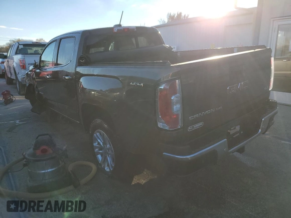 2020 GMC Canyon 4WD SLT with VIN 1GTG6DEN8L1117560, listed as a Copart auction lot 79890664 with 80,260 mi miles and Salvage Title. Bid and sale history available at carsss.com. Image 2.