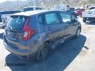 2020 Honda Fit LX with VIN 3HGGK5H40LM707356, listed as a IAAI auction lot 42076367 with 10,145 mi miles and . Bid and sale history available at DreamBid. Image 4.