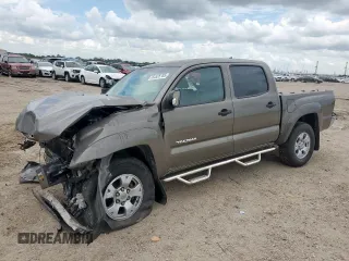 2014 Toyota Tacoma PreRunner with VIN 5TFJU4GN8EX061824, listed as a Copart auction lot 64526705 with 212,193 mi miles and Salvage title. Bid and sale history available at DreamBid. Image 1.