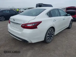2018 Nissan Altima SR with VIN 1N4AL3AP9JC210806, listed as a IAAI auction lot 41735439 with 134,119 mi miles and . Bid and sale history available at DreamBid. Image 4.