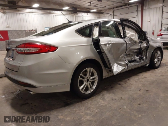 2018 Ford Fusion SE with VIN 3FA6P0HD1JR243112, listed as a IAAI auction lot 42256676 with 112,003 mi miles and . Bid and sale history available at DreamBid. Image 4.