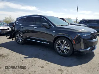 2020 Cadillac XT6 FWD Premium Luxury z VIN 1GYKPCRS9LZ126510, wystawiony jako Copart lot #58240585 z przebiegiem 57 156 mil mil oraz Szkoda całkowita • Salvage title. Historia ofert i sprzedaży dostępna na DreamBid. Obrazek 4.