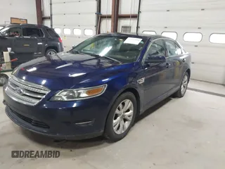 2011 Ford Taurus SEL with VIN 1FAHP2EW7BG174493, listed as a IAAI auction lot 41697856 with 143,957 mi miles. Bid and sale history available at carsss.com. Image 2.