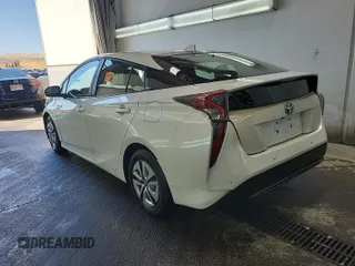 2017 Toyota Prius Two with VIN JTDKARFU6H3047726, listed as a IAAI auction lot 42619600 with 215,918 mi miles and . Bid and sale history available at DreamBid. Image 2.