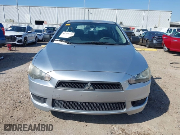 2010 Mitsubishi Lancer DE with VIN JA32U1FU4AU015574, listed as a IAAI auction lot 41770332 with 125,458 mi miles. Bid and sale history available at carsss.com. Image 11.