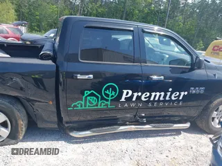 2013 Ram 1500 SLT z VIN 1C6RR6LG8DS545809, wystawiony jako IAAI lot #42013194 z przebiegiem 154 603 mil mil oraz . Historia ofert i sprzedaży dostępna na DreamBid. Obrazek 13.
