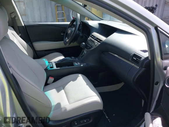 2015 Lexus RX 450h with VIN 2T2ZB1BA4FC002602, listed as a IAAI auction lot 41812562 with 166,220 mi miles and . Bid and sale history available at DreamBid. Image 5.