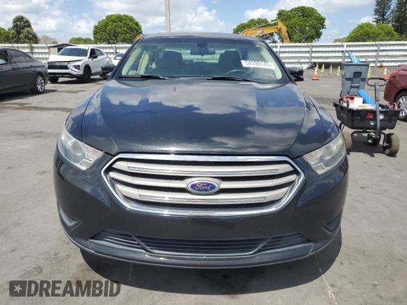 2015 Ford Taurus SE with VIN 1FAHP2D86FG140750, listed as a Copart auction lot 54390145 with 128,163 mi miles and Salvage Title. Bid and sale history available at carsss.com. Image 5.
