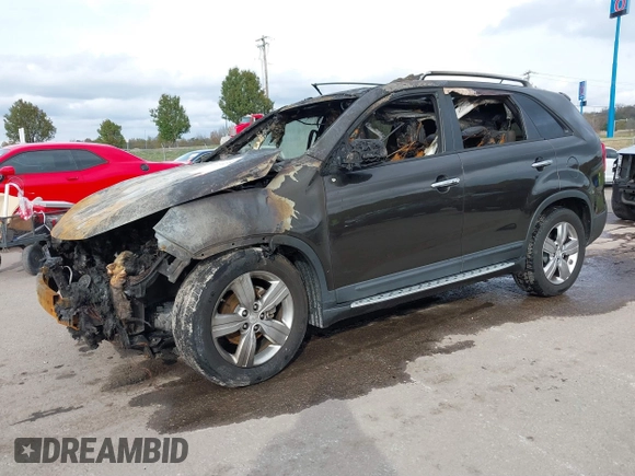 2012 Kia Sorento EX z VIN 5XYKU4A28CG228167, wystawiony jako IAAI lot #40730275 z przebiegiem Nie podano mil oraz . Historia ofert i sprzedaży dostępna na DreamBid. Obrazek 2.