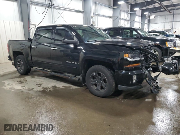 2017 Chevrolet Silverado 1500 LT with VIN 3GCUKREC2HG116505, listed as a Copart auction lot 53469345 with 118,329 mi miles and Salvage Title. Bid and sale history available at DreamBid. Image 4.
