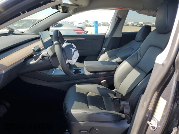 2023 Tesla Model Y Long Range with VIN 7SAYGDEE2PA164405, listed as a Copart auction lot 50085905 with 42,156 mi miles and Salvage Title. Bid and sale history available at DreamBid. Image 7.