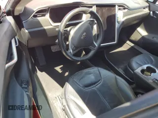 2014 Tesla Model S 60 with VIN 5YJSA1H1XEFP31861, listed as a Copart auction lot 65275815 with Not provided miles and Clean title. Bid and sale history available at DreamBid. Image 8.