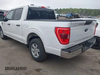 2023 Ford F-150 XL with VIN 1FTEW1C85PKD35491, listed as a IAAI auction lot 41923354 with 51,492 mi miles. Bid and sale history available at carsss.com. Image 3.