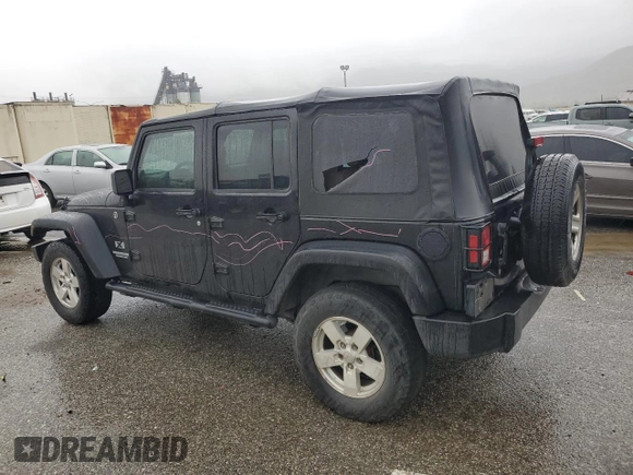 2009 Jeep Wrangler Unlimited X with VIN 1J4GA39119L755818, listed as a Copart auction lot 47886245 with 187,972 mi miles and Salvage Title. Bid and sale history available at carsss.com. Image 2.