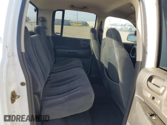 2001 Dodge Dakota Sport z VIN 1B7GL2AN81S120632, wystawiony jako Copart lot #50730415 z przebiegiem 191 302 mil mil oraz Czysty tytuł • Clean title. Historia ofert i sprzedaży dostępna na DreamBid. Obrazek 10.