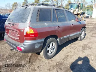 2004 Hyundai Santa Fe GLS with VIN KM8SC13E34U708007, listed as a IAAI auction lot 41414729 with 999,999 mi miles. Bid and sale history available at carsss.com. Image 4.