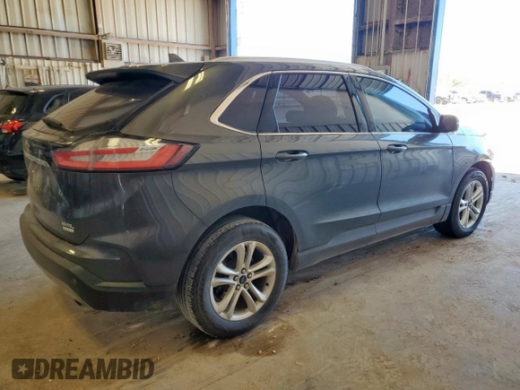 2019 Ford Edge SEL z VIN 2FMPK3J96KBC72783, wystawiony jako Copart lot #57761175 z przebiegiem 153 590 mil mil oraz Czysty tytuł • Clean title. Historia ofert i sprzedaży dostępna na DreamBid. Obrazek 3.