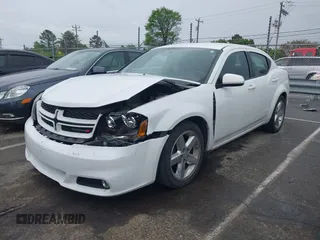 2013 Dodge Avenger SXT with VIN 1C3CDZCG9DN772959, listed as a IAAI auction lot 41971187 with 121,530 mi miles and . Bid and sale history available at carsss.com. Image 2.