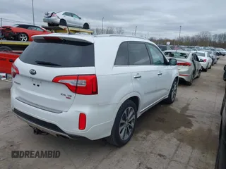 2014 Kia Sorento SX with VIN 5XYKWDA7XEG489258, listed as a IAAI auction lot 42004637 with 95,904 mi miles. Bid and sale history available at carsss.com. Image 4.