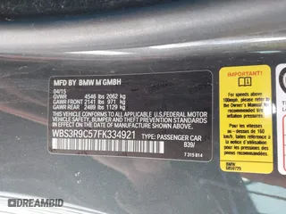 2015 BMW M4 with VIN WBS3R9C57FK334921, listed as a IAAI auction lot 41869773 with 107,058 mi miles. Bid and sale history available at carsss.com. Image 9.